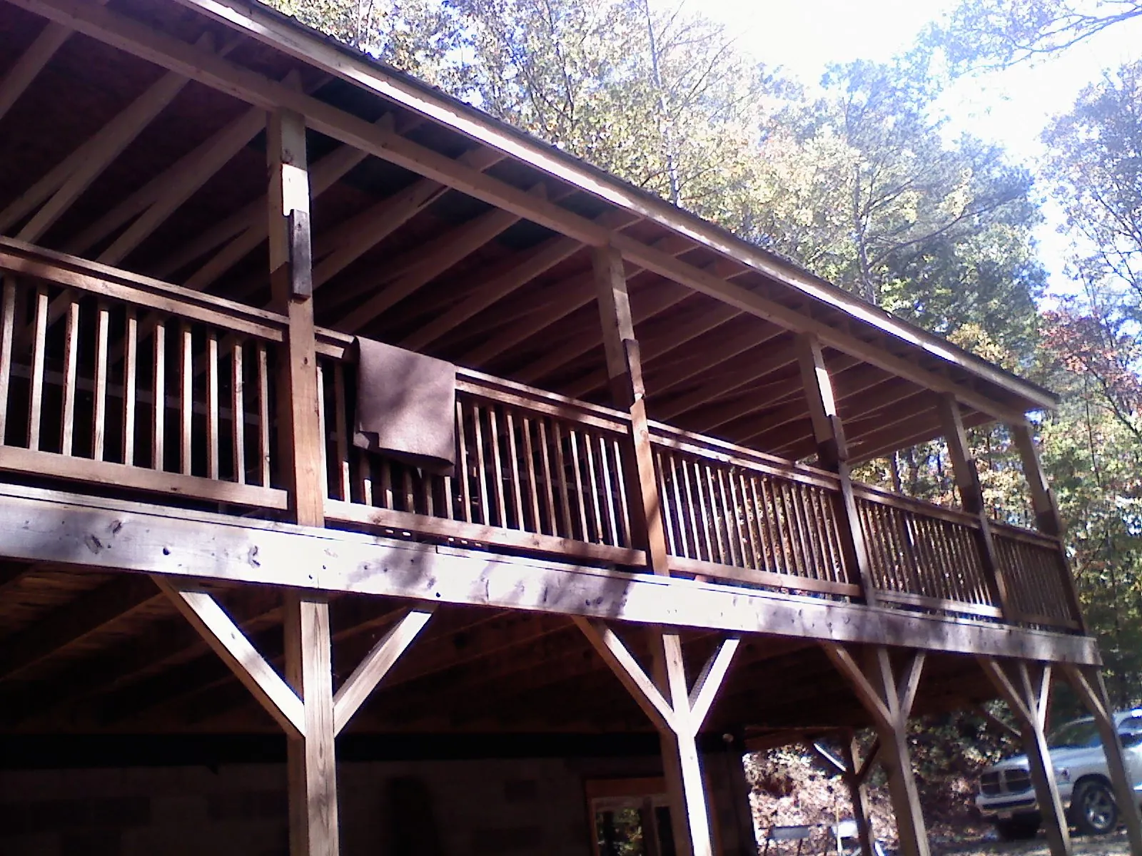 Timber framing under a new elevated porch and deck — Roof Leak Repair in Cornville by Roofing Brothers